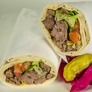 Kofta kabob sandwich wrap. Middle Eastern beef kabob wrap.