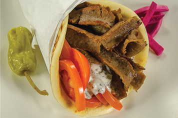 Flat bread gyro sandwich wraps. Mediterranean gyro wrap.